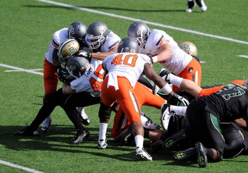 Dec 1 2012 Waco TX USA Baylor Bears running back Glasco Martin 8 is gang tackled by the Oklahoma State Cowboys defense during the first half at Floyd Casey Stadium. Mandatory Credit Jerome Miron US PRESSWIRE Dec 1 2012 Waco TX USA Baylor Bears running back Glasco Martin 8 is gang tackled by the Oklahoma State Cowboys defense during the first half at Floyd Casey Stadium. Mandatory Credit Jerome Miron US PRESSWIRE